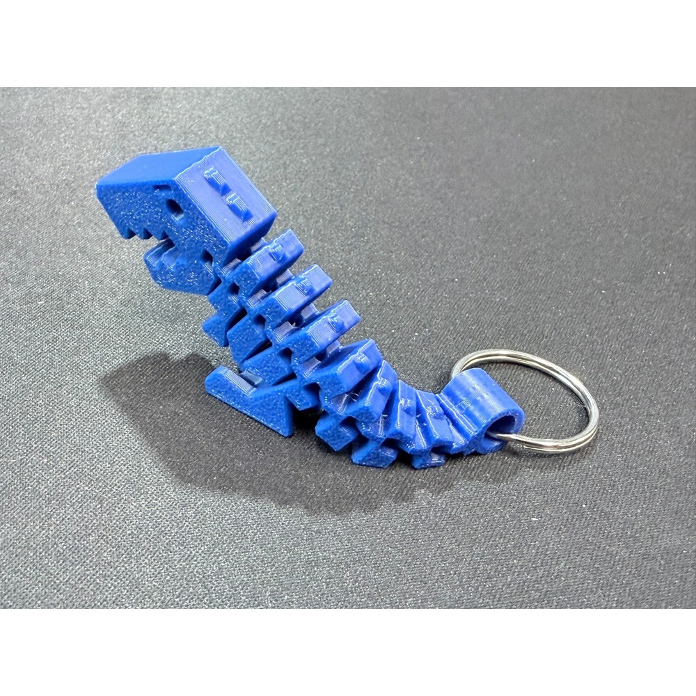 3D Printed Articulated T-Rex Keychain Blue Flexible Dinosaur Toy - Picture 4 of 4